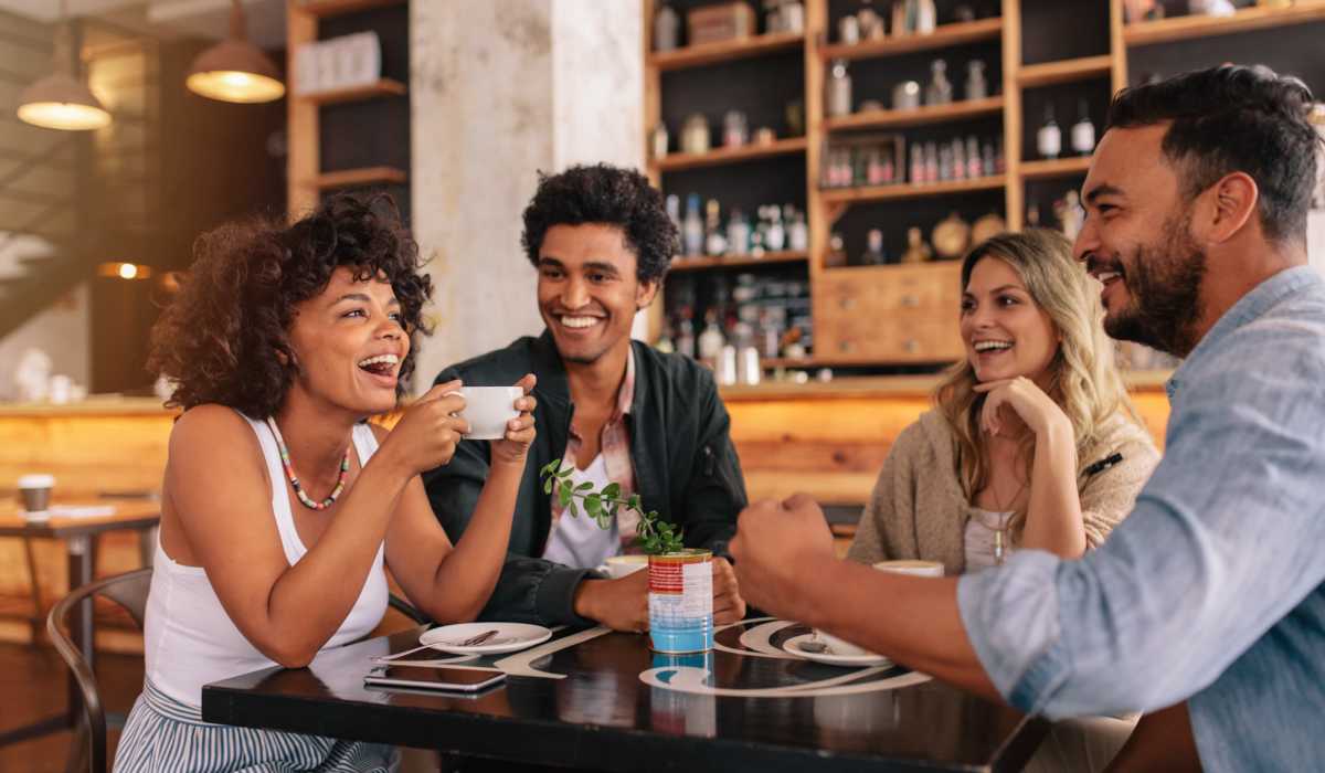 Friends having coffee near Maddox in Dallas, Texas