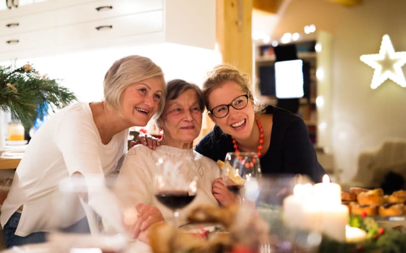 Happy family having meal at Grand Villa of Delray Beach East in Delray Beach, Florida