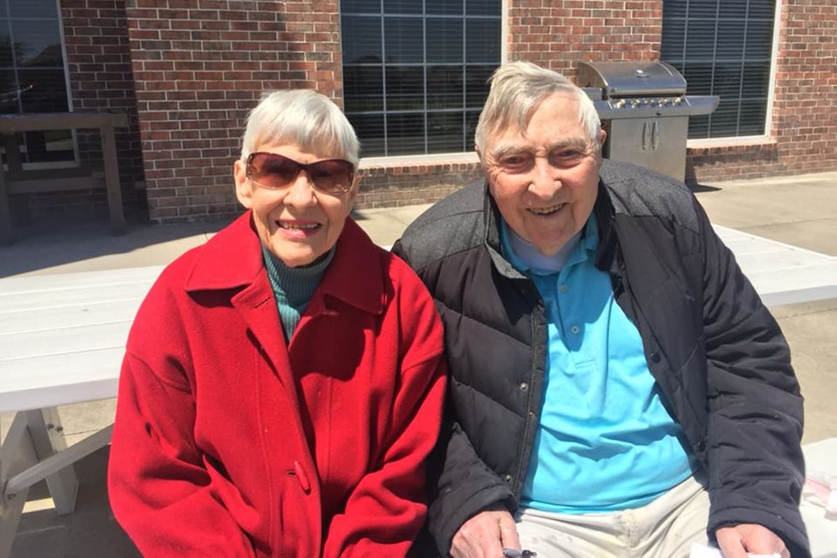 A happy couple in the courtyard at Parsons House Frisco in Frisco, Texas