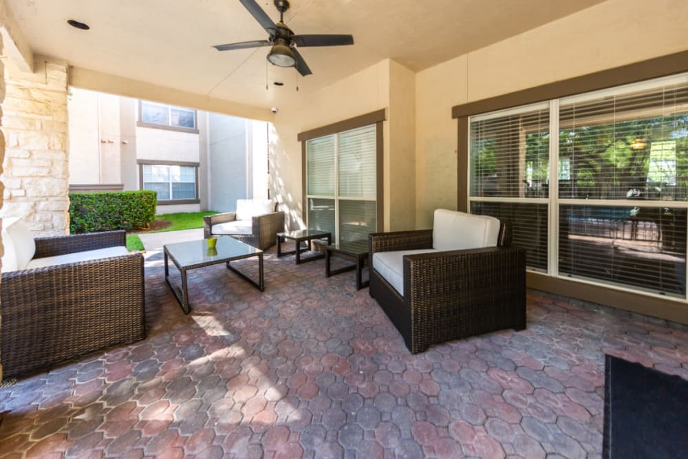 Private patio lounge area at Marquis at Ladera Vista in Austin, Texas