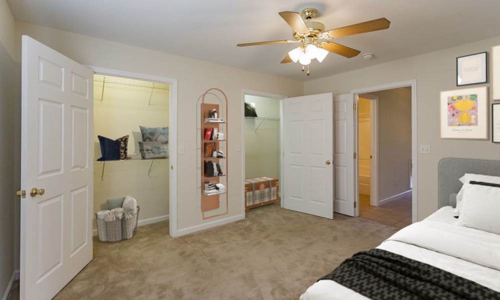 Bright master bedroom at Home Place Apartments in East Ridge, Tennessee
