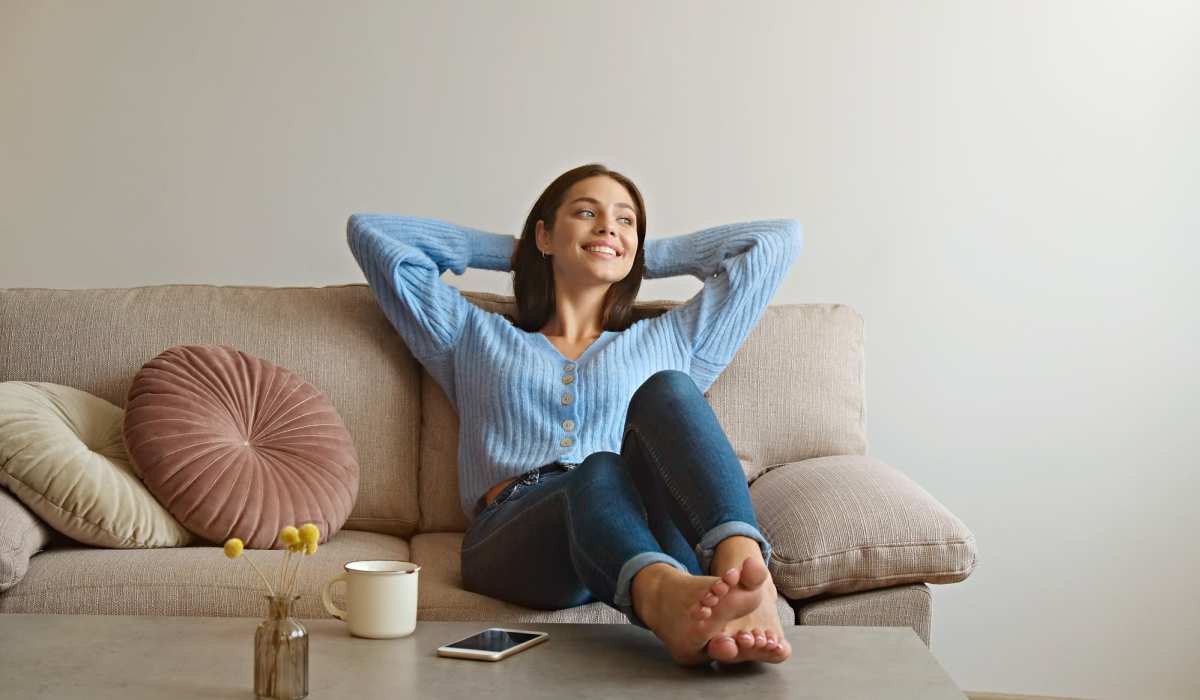Resident woman relaxing at The Mayfair in Gainesville, Florida