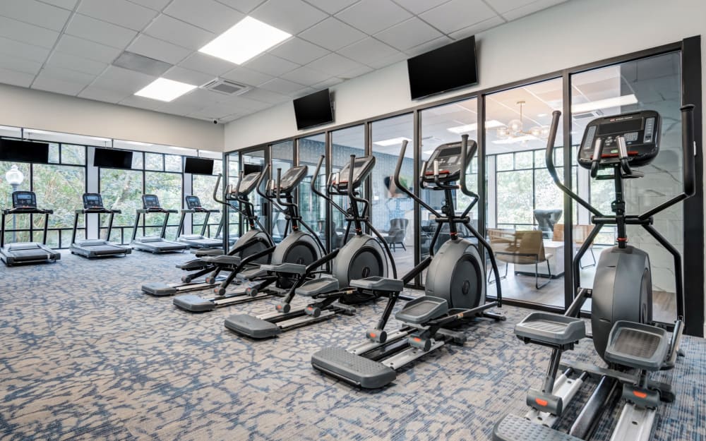 Fitness center with cardio equipment at Willow Run at Mark Center Apartment Homes in Alexandria, Virginia