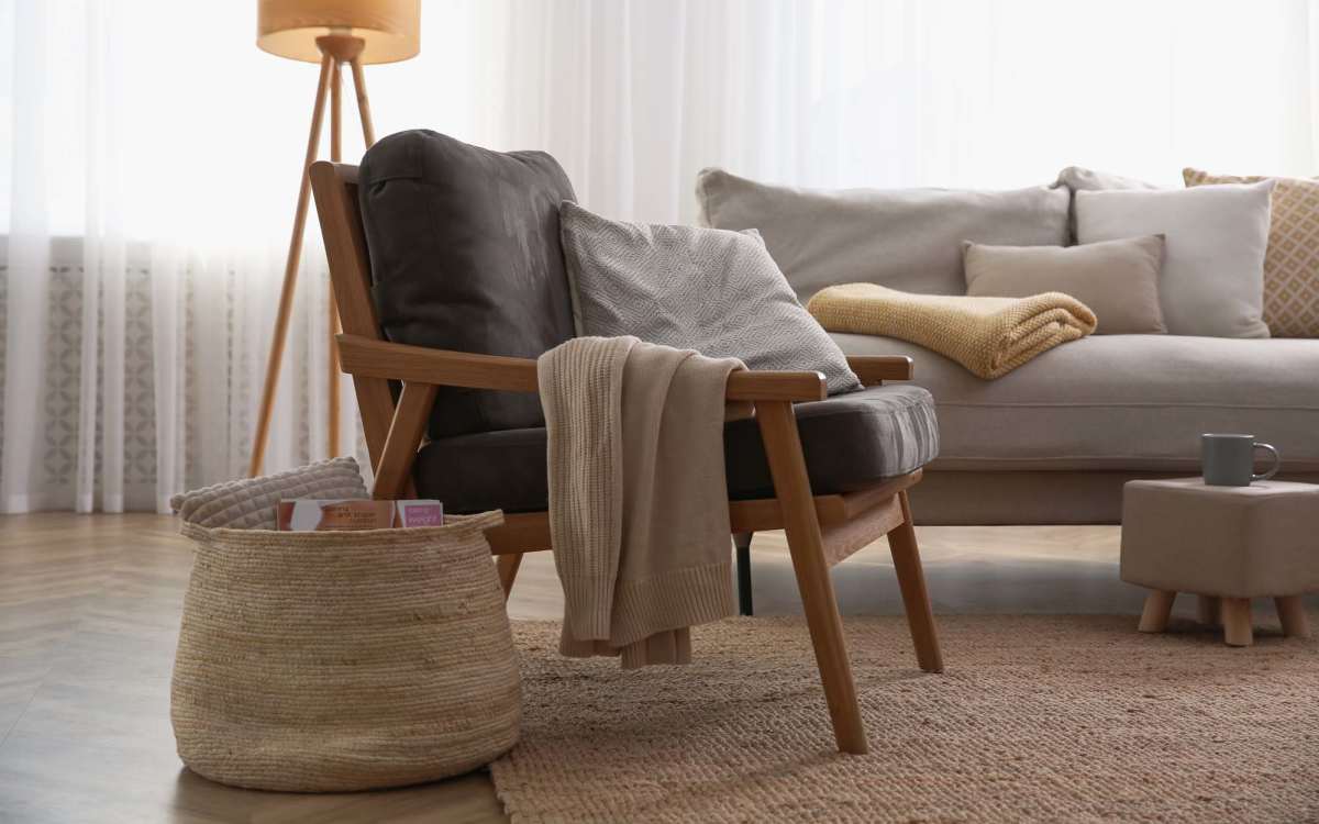 Living room with a comfortable sofa at Baker Manor Apartments in Macclenny, Florida