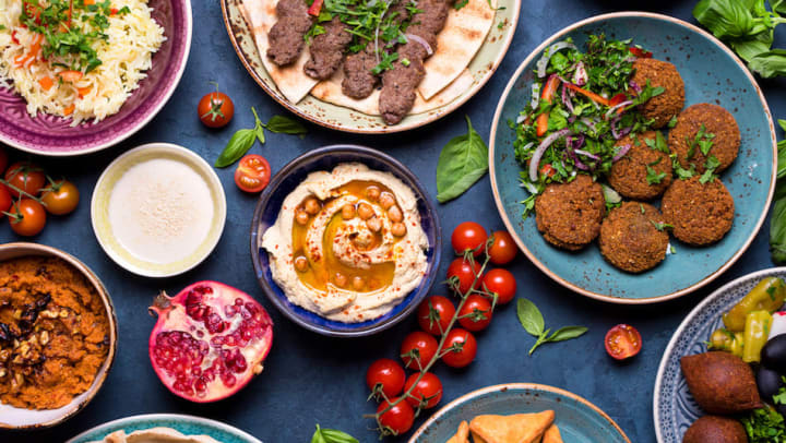 An assortment of colorful Middle Eastern food dishes