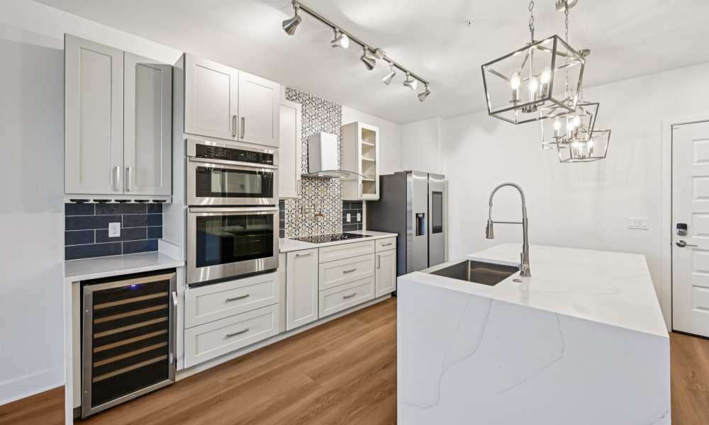 Luxurious model kitchen with wine fridge at The Vivien in Vero Beach, Florida