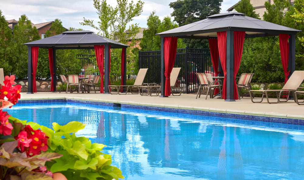 Gorgeous pool area at The Trilogy Apartments in Belleville