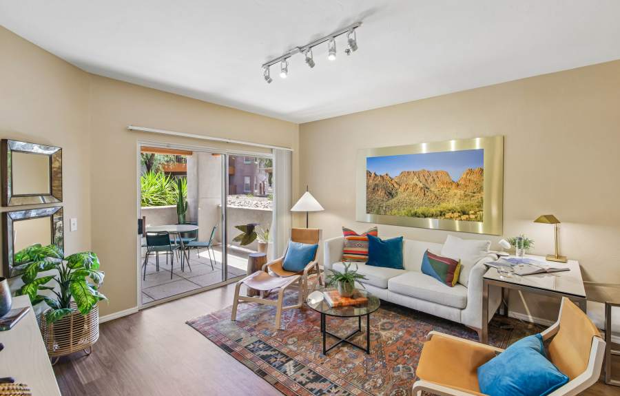 Carpeted Living Room with Glass Center table at The Golf Villas at Oro Valley in Tucson, Arizona