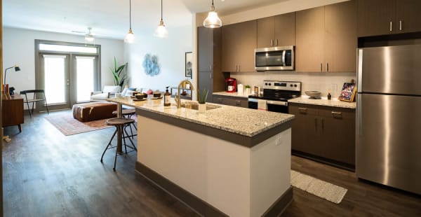 Kitchen and dining area at The Crest at Flowery Branch in Flowery Branch, Georgia