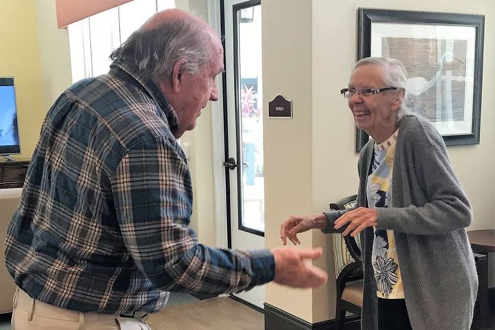 two senior residents dancing