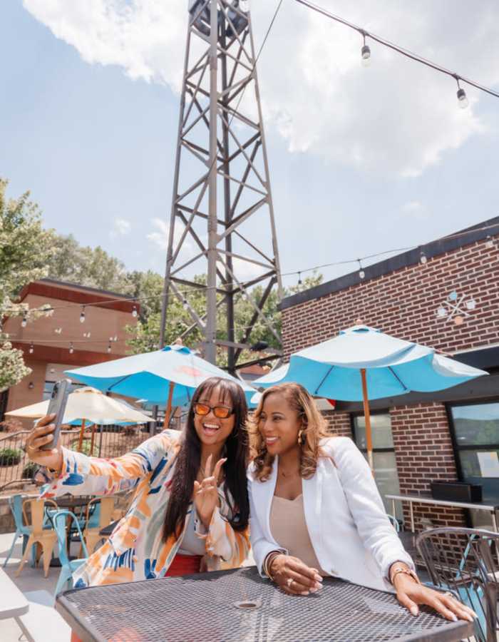 Residents enjoying a cafe near Saylor at Southside Trail in Atlanta, Georgia