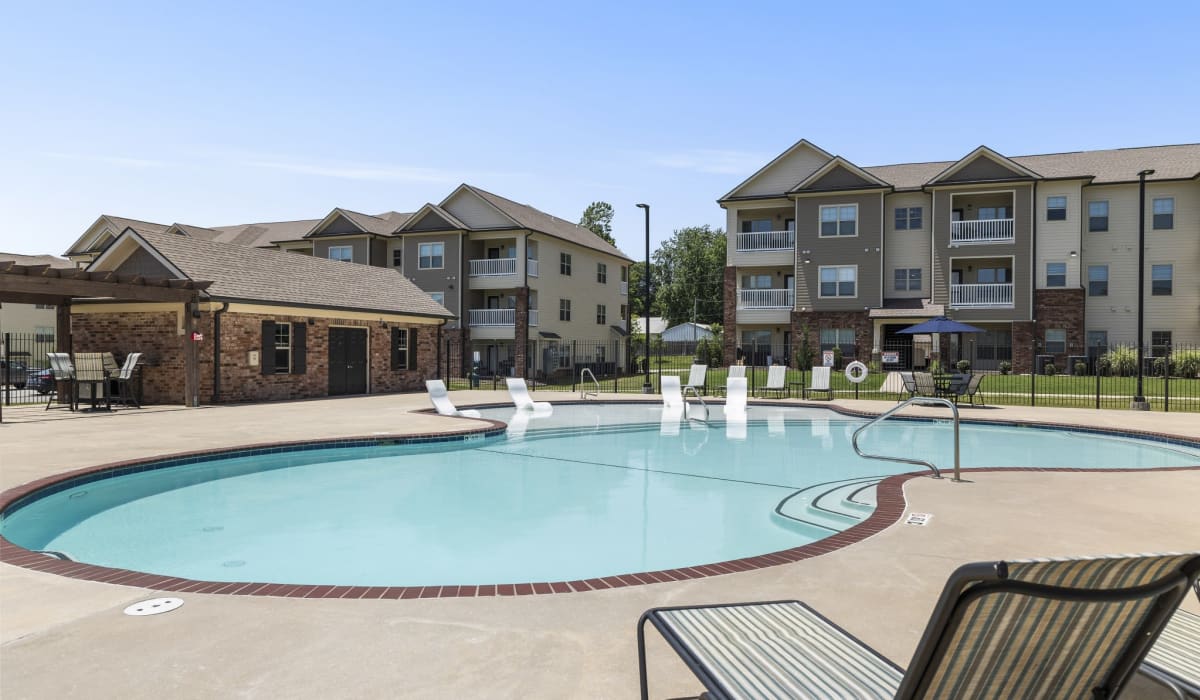 Relax by our outdoor swimming pool at The Maddox in Centerton, Arkansas