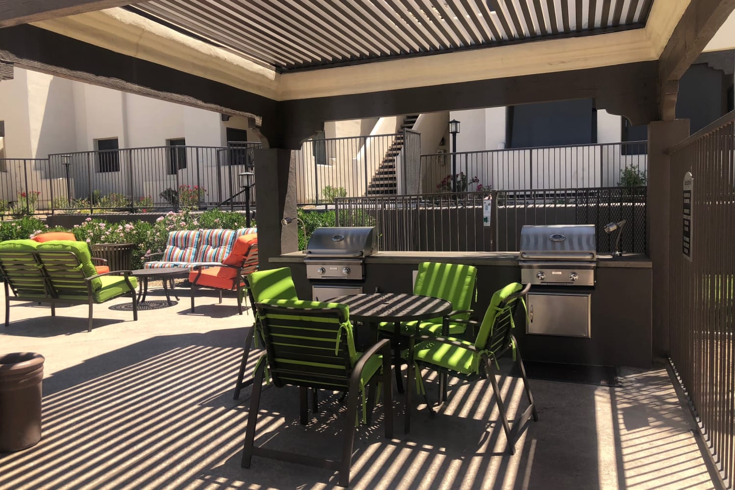 Outdoor seating in the courtyard at Casa Santa Fe Apartments in Scottsdale, Arizona