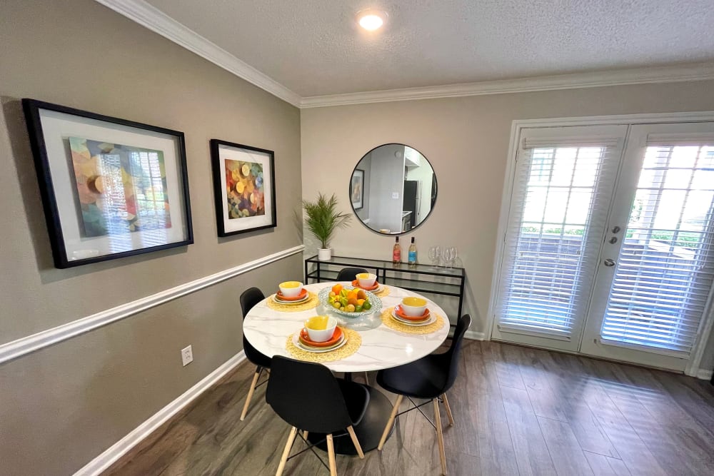 Dining nook in a apartment at The Abbey at Montgomery Park in Conroe, Texas