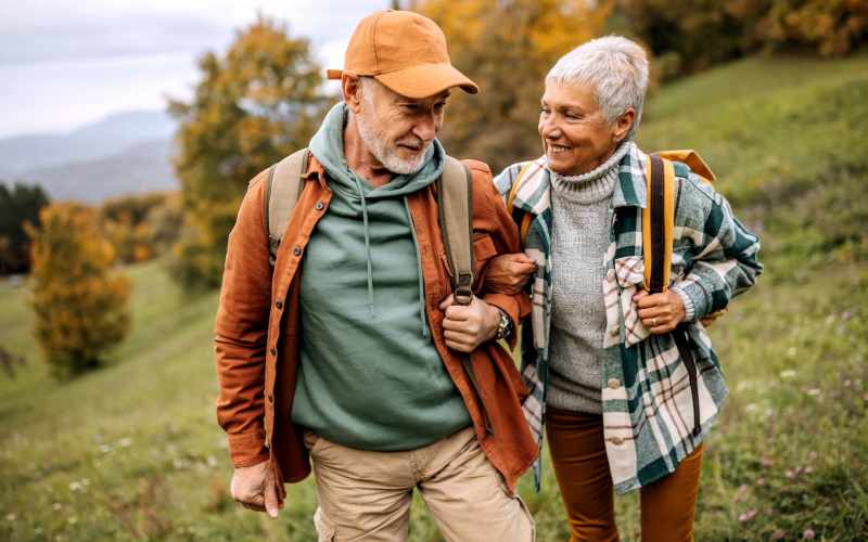 Senior couple holding hands at Grand Villa of Ocala in Ocala, Florida