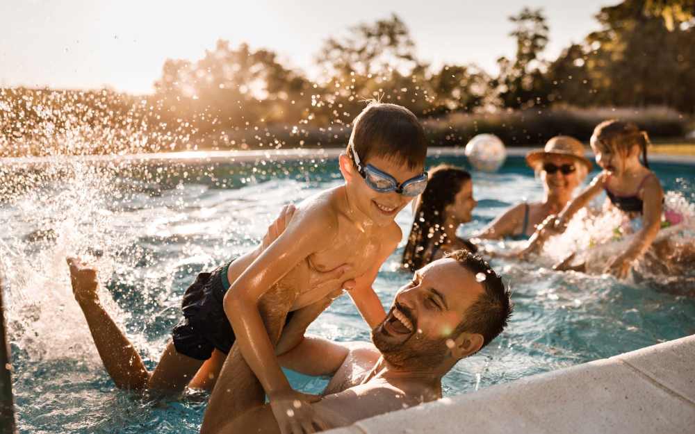 Resident enjoying in the pool at Colt's Crossing Apartments in Georgetown, Kentucky 