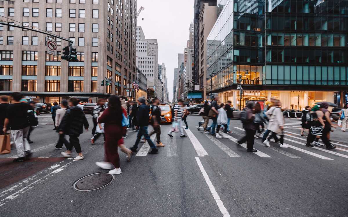 People crossing road at Park City Place in Bridgeport, Connecticut