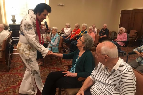 Residents enjoying an Elvis impersonator at Wesley Gardens in Montgomery, Alabama. 