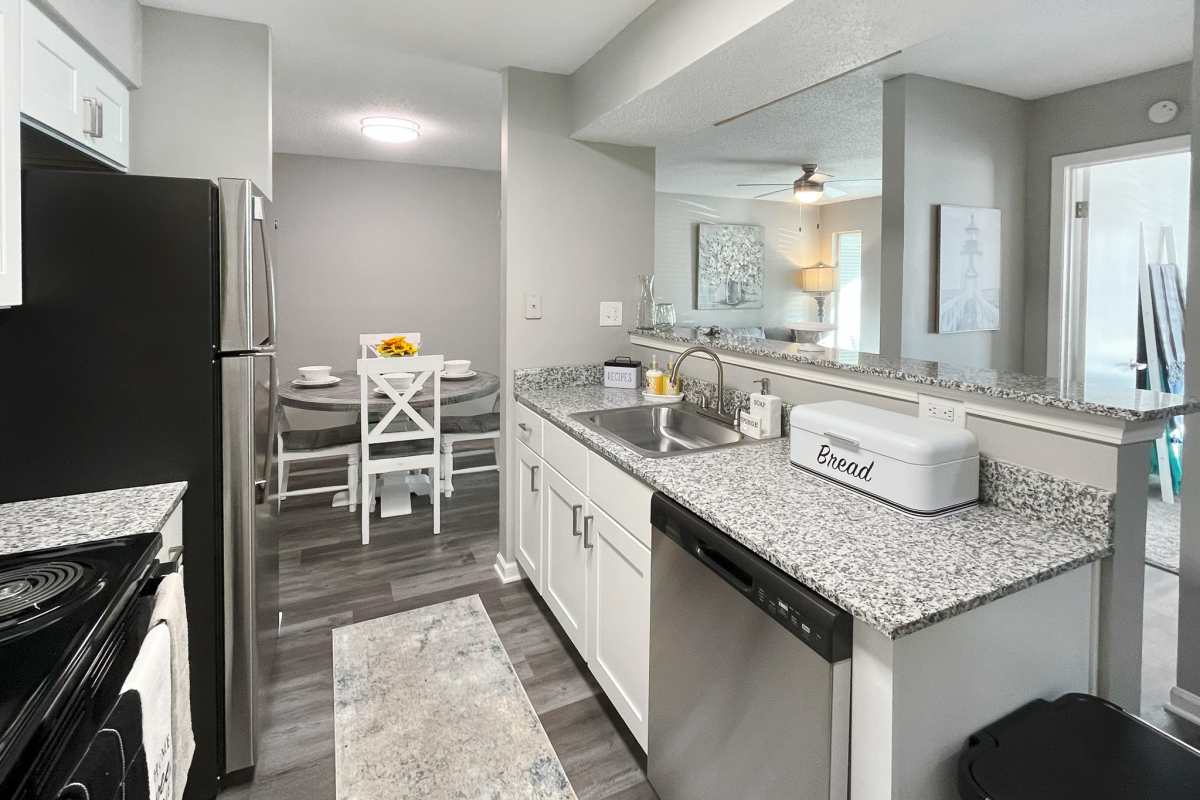 Kitchen and dining area at Trinity Lakes in Cordova, Tennessee