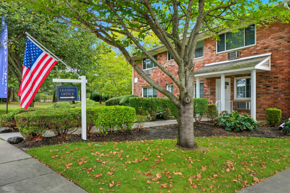 Outdoor Apartmentr View with Green Landscaping at Eagle Rock Apartments at Nesconset in Nesconset, New York