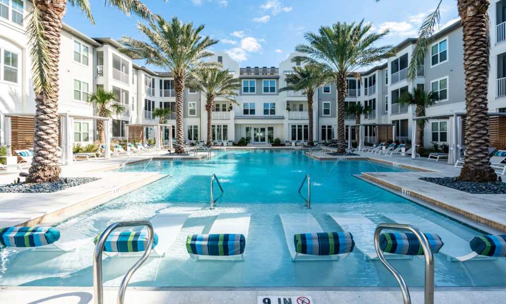 A view of our apartments surrounding the swimming pool at The Beacon in New Smyrna Beach, Florida