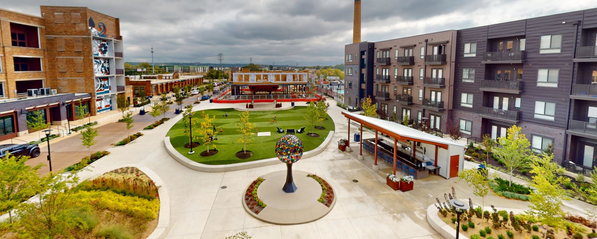 Central Green Park and One-Eyed Jacks Patio Bar at Factory 52 Apartments in Norwood, OH
