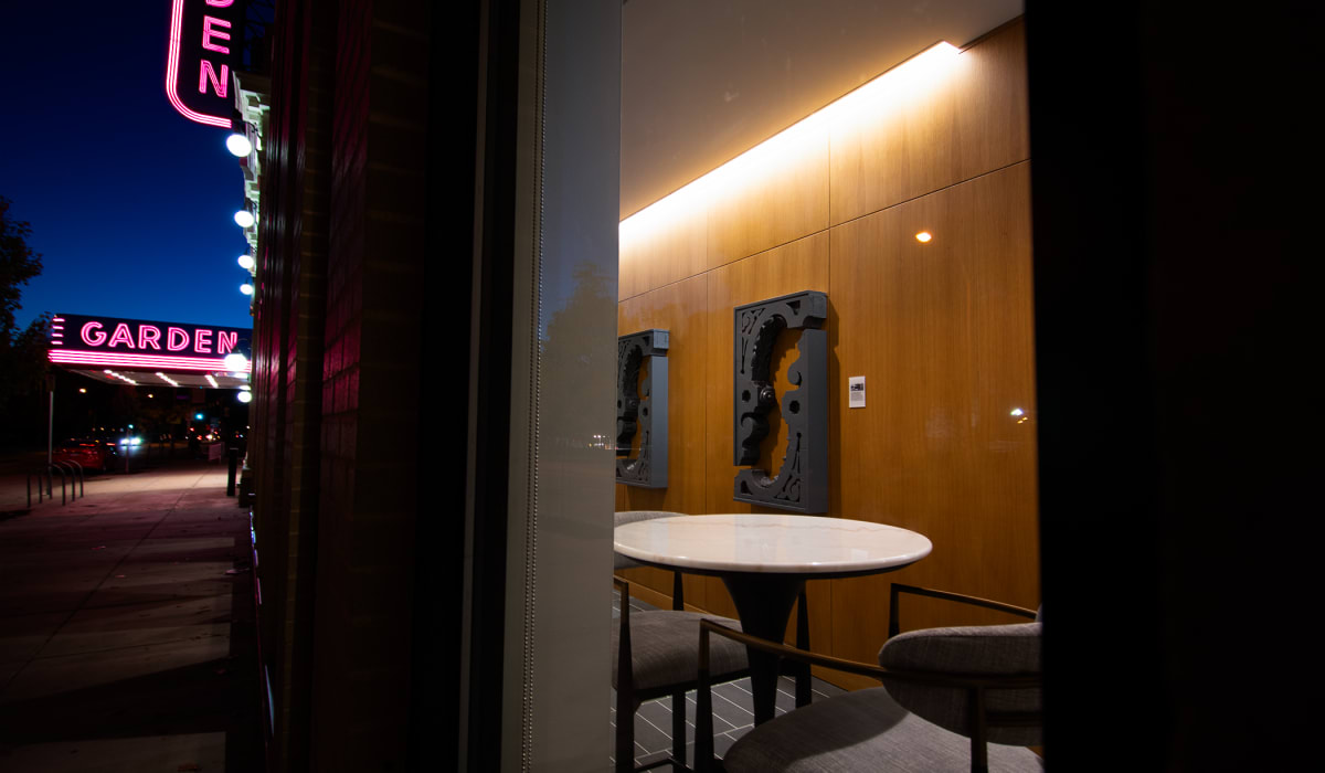 Garden sign and artifacts at The Garden in Pittsburgh, Pennsylvania