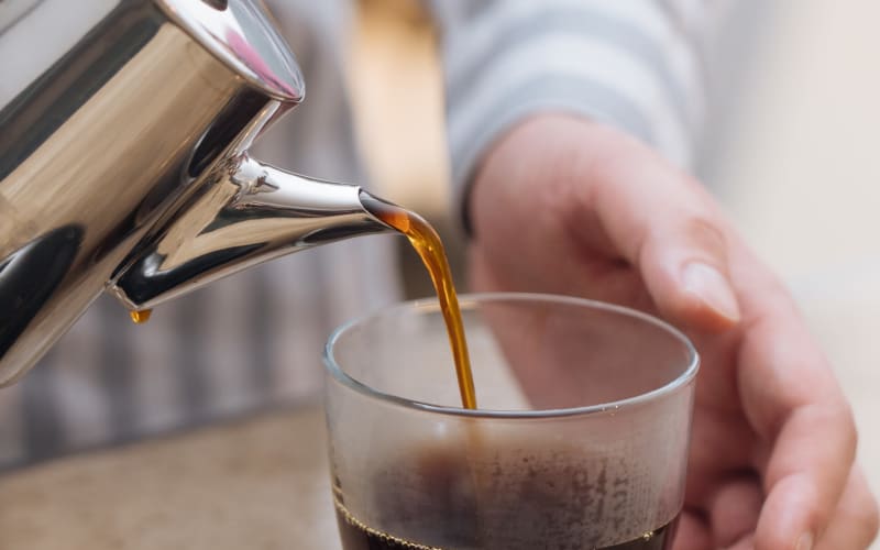 Coffee pouring at Amira Choice Bloomington in Bloomington, Minnesota