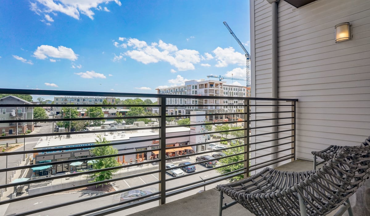 Private balcony with chair at One305 Central in Charlotte, North Carolina