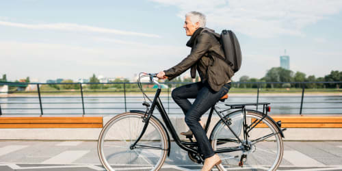 Resident riding a bike near Laguna Senior in Los Angeles, California