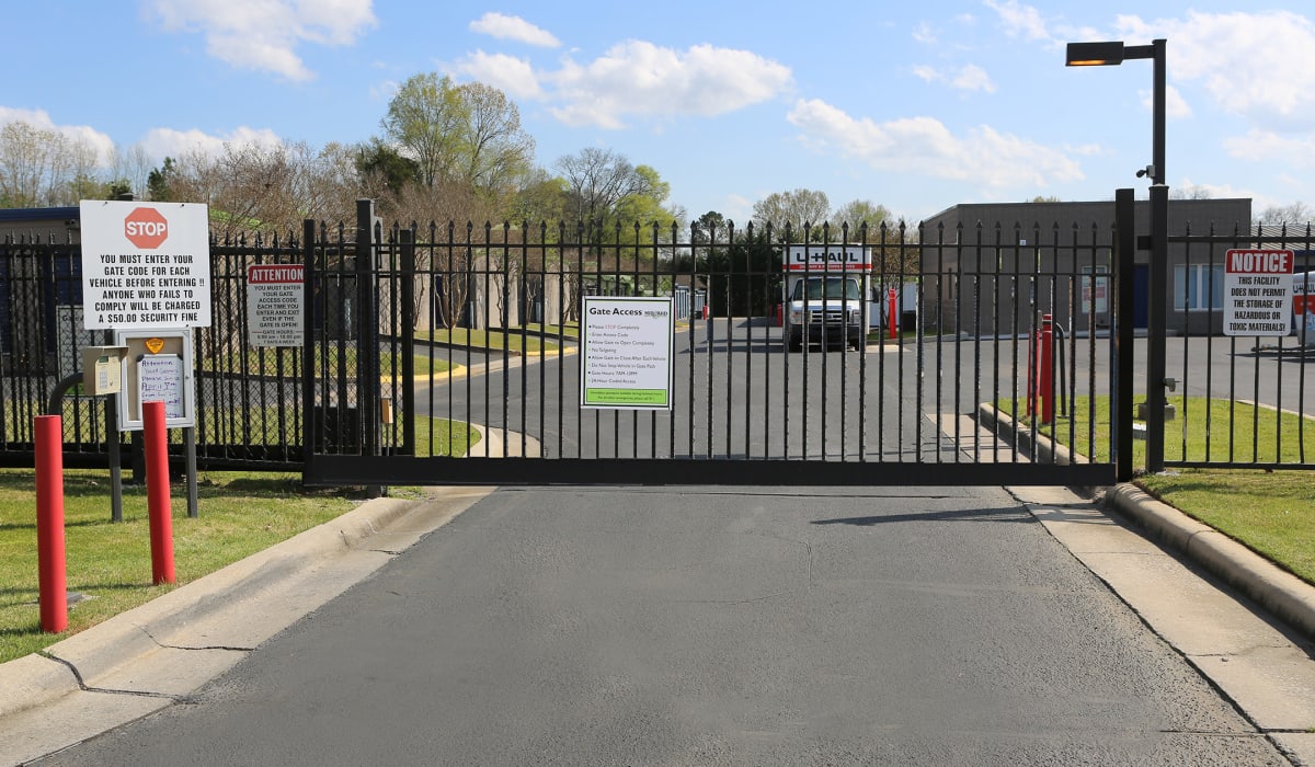 Gated entrance at Midgard Self Storage in Midland, North Carolina