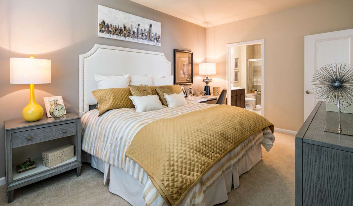 Bedroom with side lamps at One Glastonbury Place in Glastonbury, Connecticut