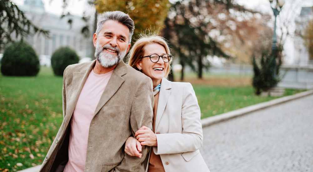 Happy resident couple near Village Center in Detroit, Michigan