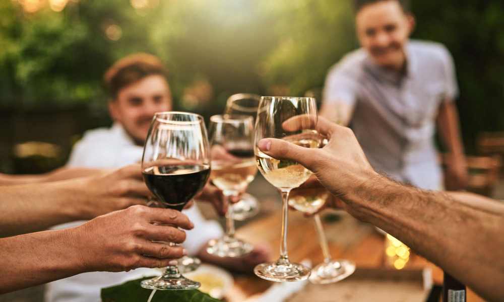 Resident raising a glass at Villas at Stonebridge in Owasso, Oklahoma