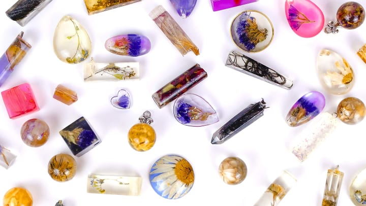 Resin pendants with flowers inside.
