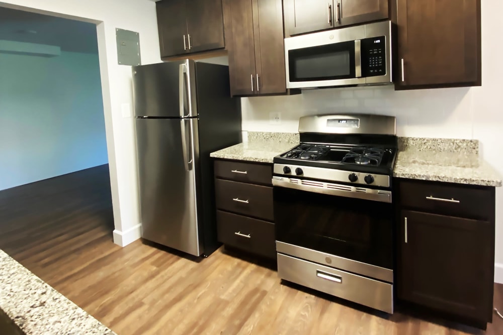 Model kitchen with stainless-steel appliances at Marrion Square Apartments in Pikesville, Maryland
