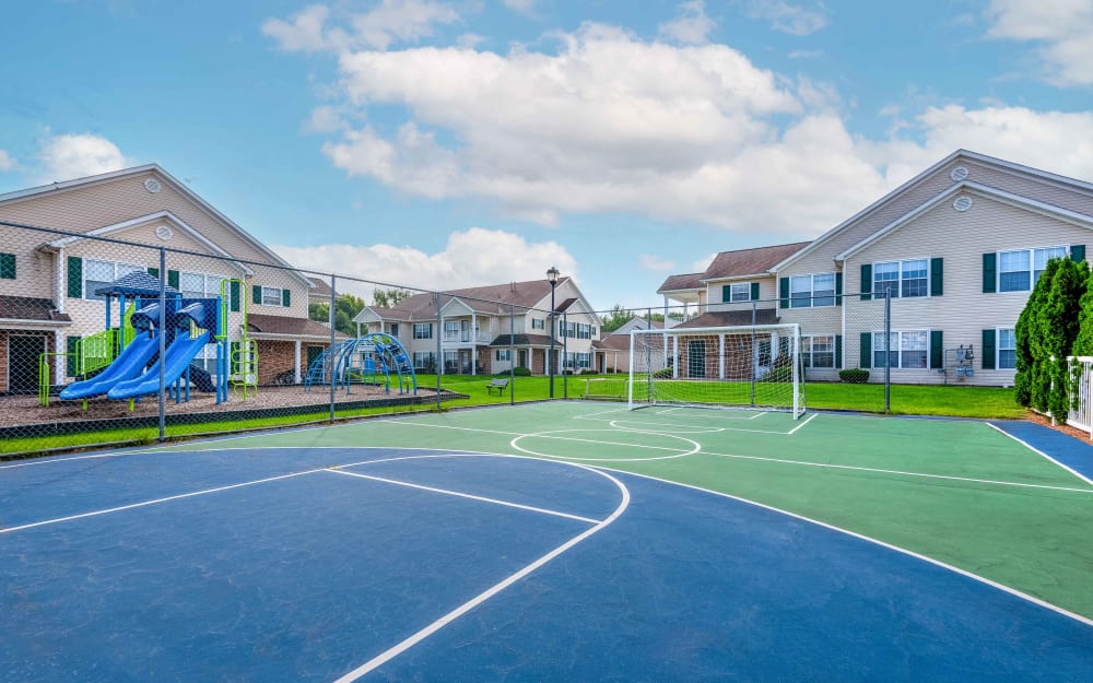 Sports court and playground at Westview Commons Apartments in Rochester, New York