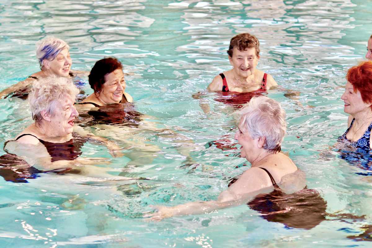 Resident swimming together atWatermere at Frisco in Frisco, Texas