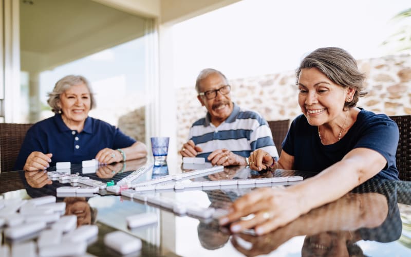 Residents playing a game at a MBK Senior Living community