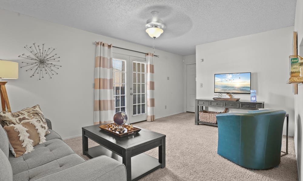 the Open and bright model living room at Cimarron Pointe Apartments in Oklahoma City, Oklahoma