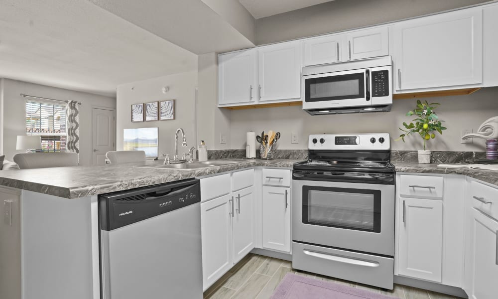 Kitchen at Mission Point Apartments in Moore, Oklahoma