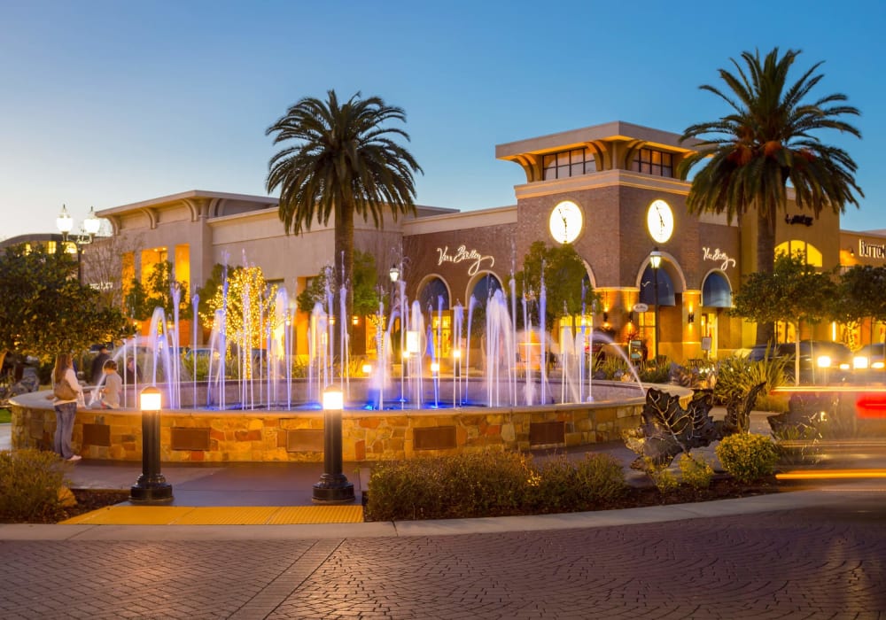 Mall with fountain nearby at Woodstream Townhomes in Rocklin, California