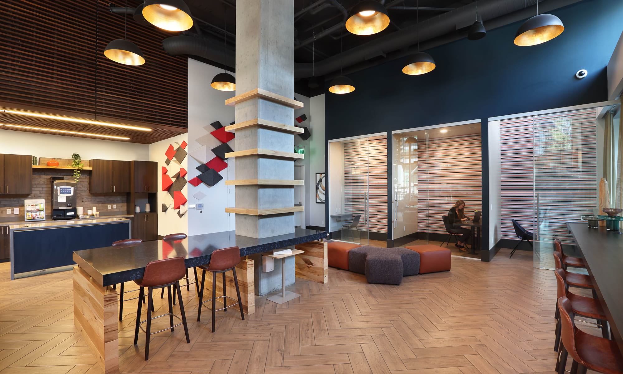 First floor work hub with coffee machine and private work spaces at luxury high-rise community of Liberty SKY in Salt Lake City, Utah