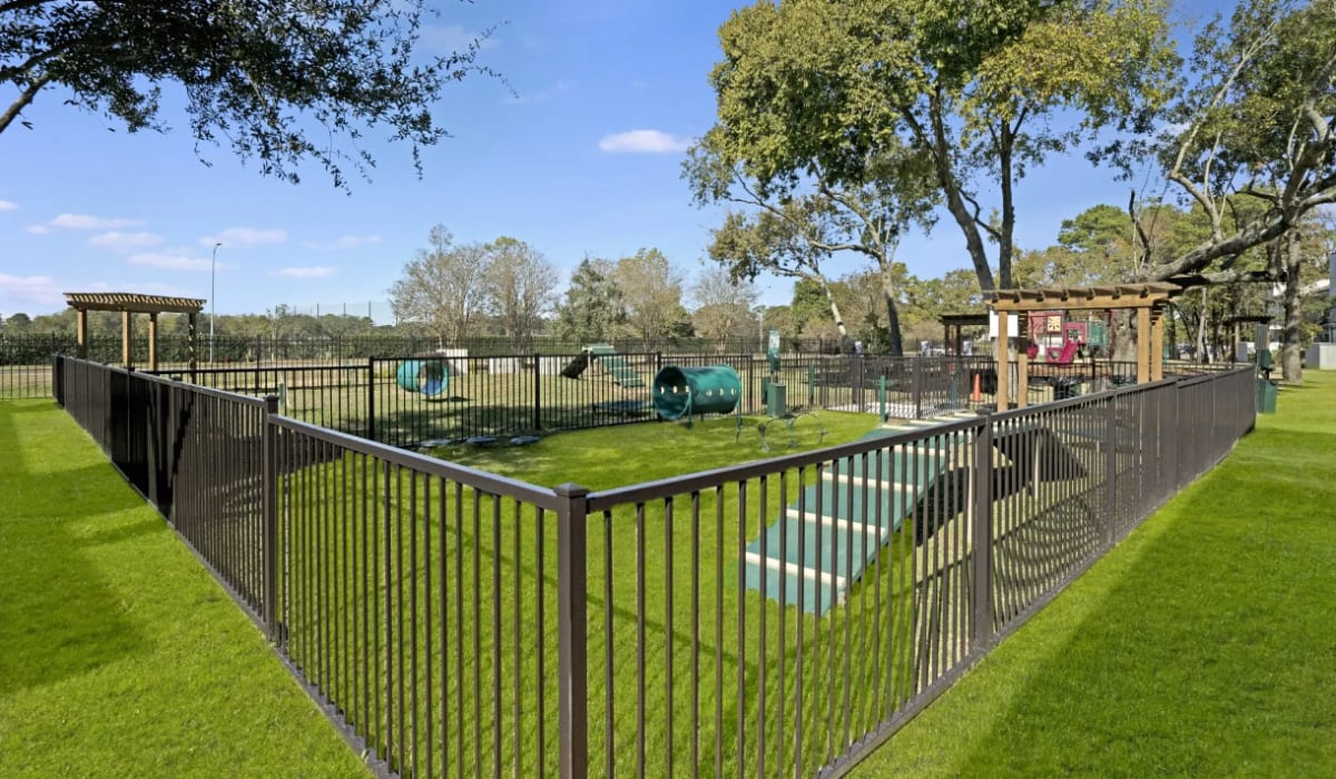 fenced pet play area at Latitude 2976 in Houston, Texas