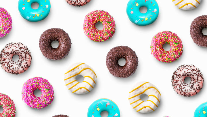 Brightly colored donuts on a white background