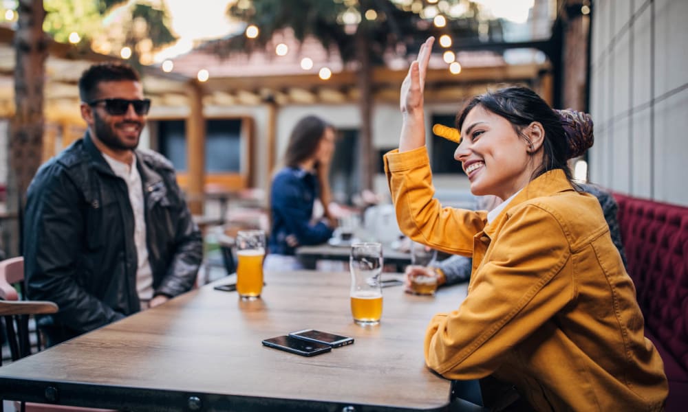 Residents out for a nice beer at their favorite downtown beer garden near Circle at Point Park in Houston, Texas