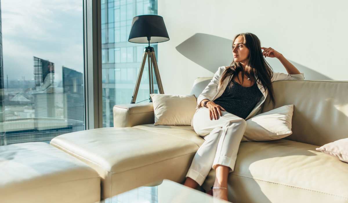 A resident takes in the view from her apartment at Attain Downtown, Norfolk, Virginia