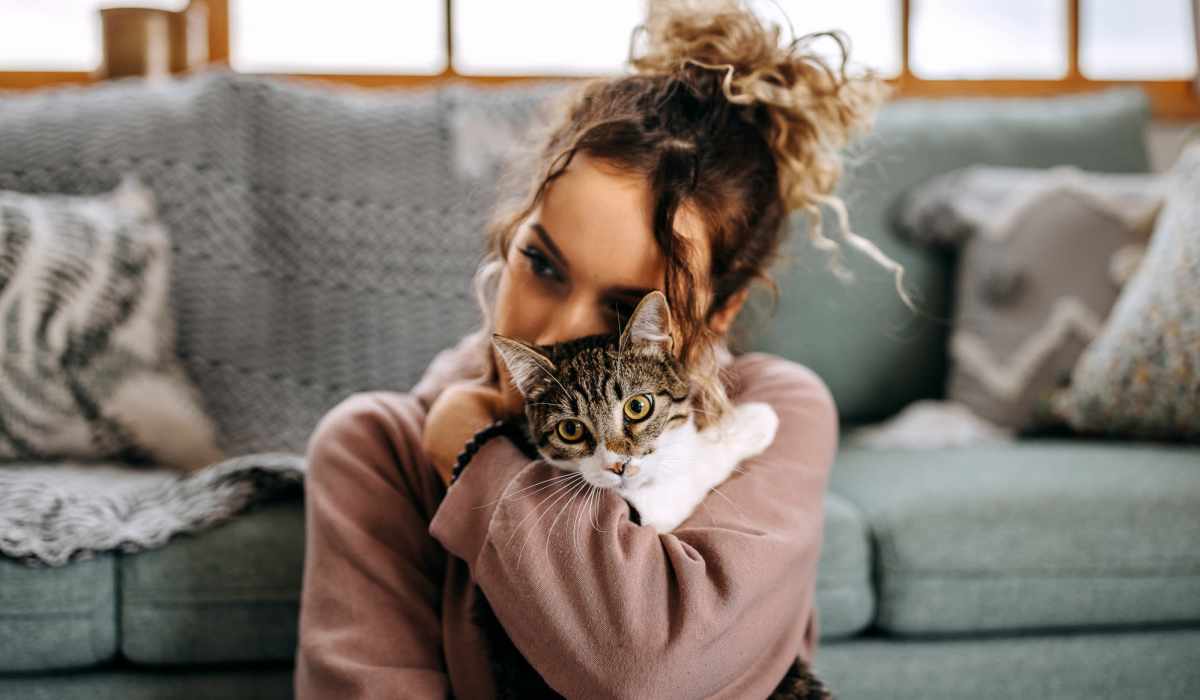 Residnet with her cat at Village at First in Gilroy, California