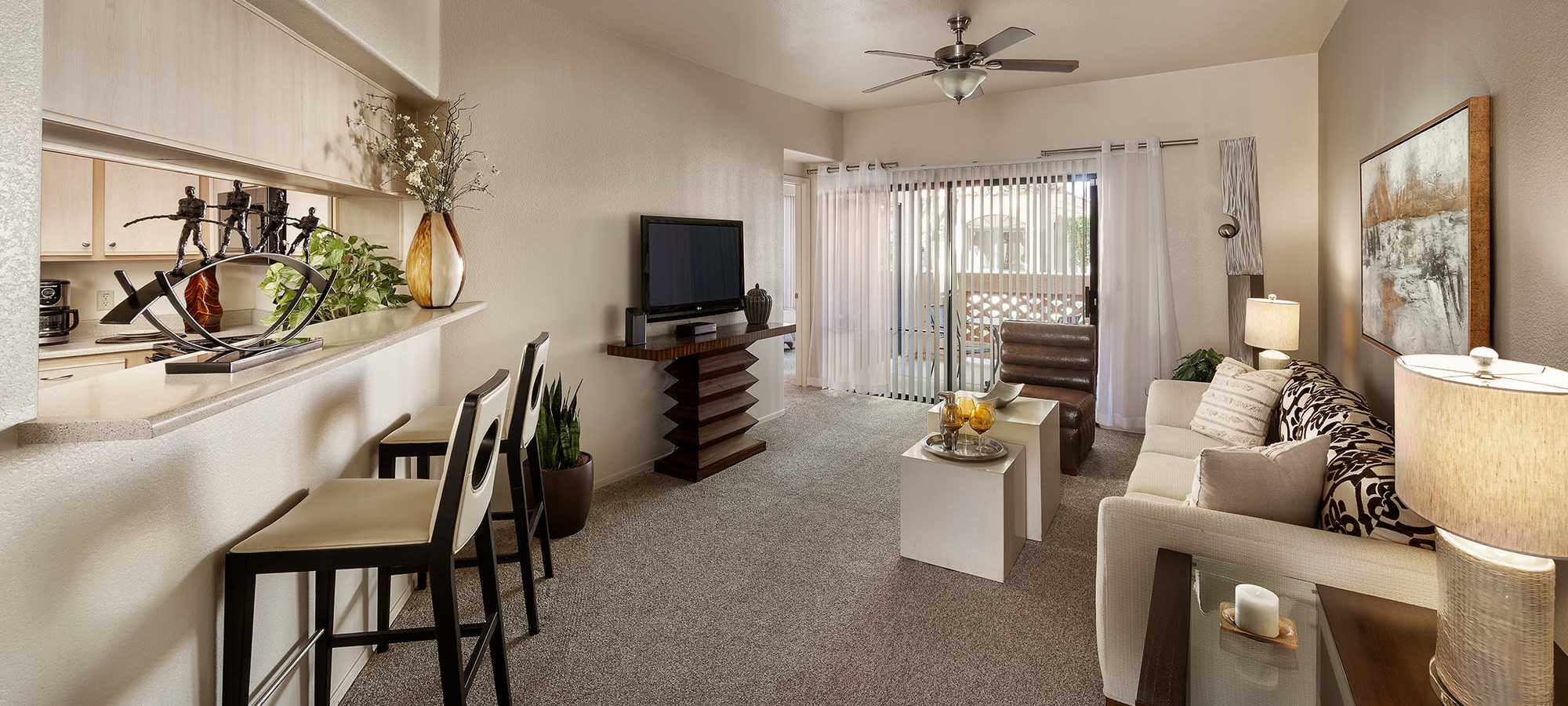 Modern decor in the open-concept living area of a model home at San Palmilla in Tempe, Arizona