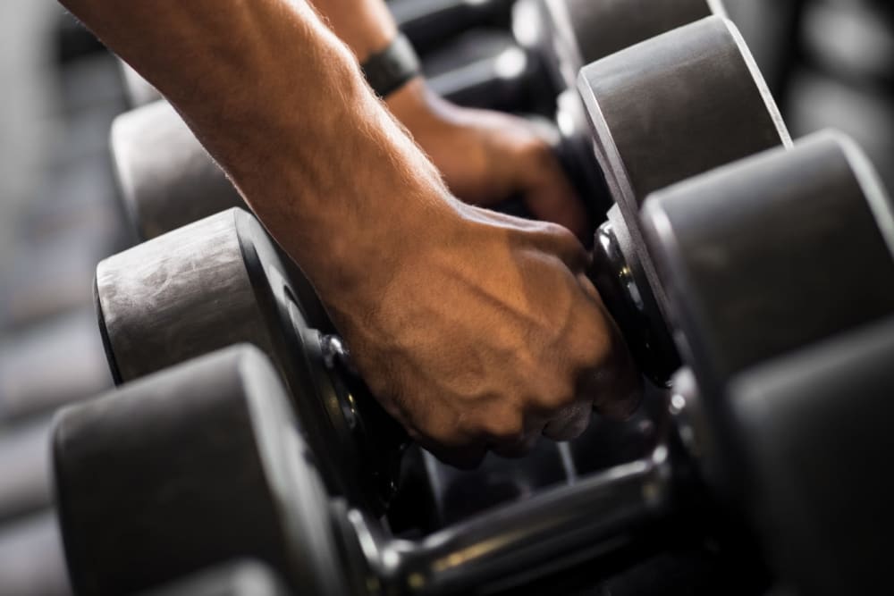 Resident lifting weights at Lehigh Square in Allentown, Pennsylvania